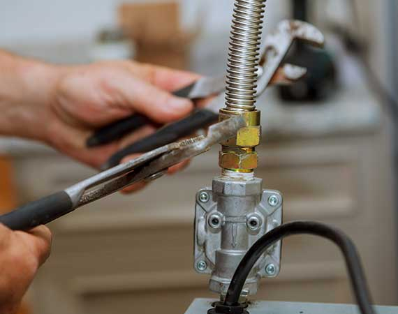 Gasline repairs by a plumber